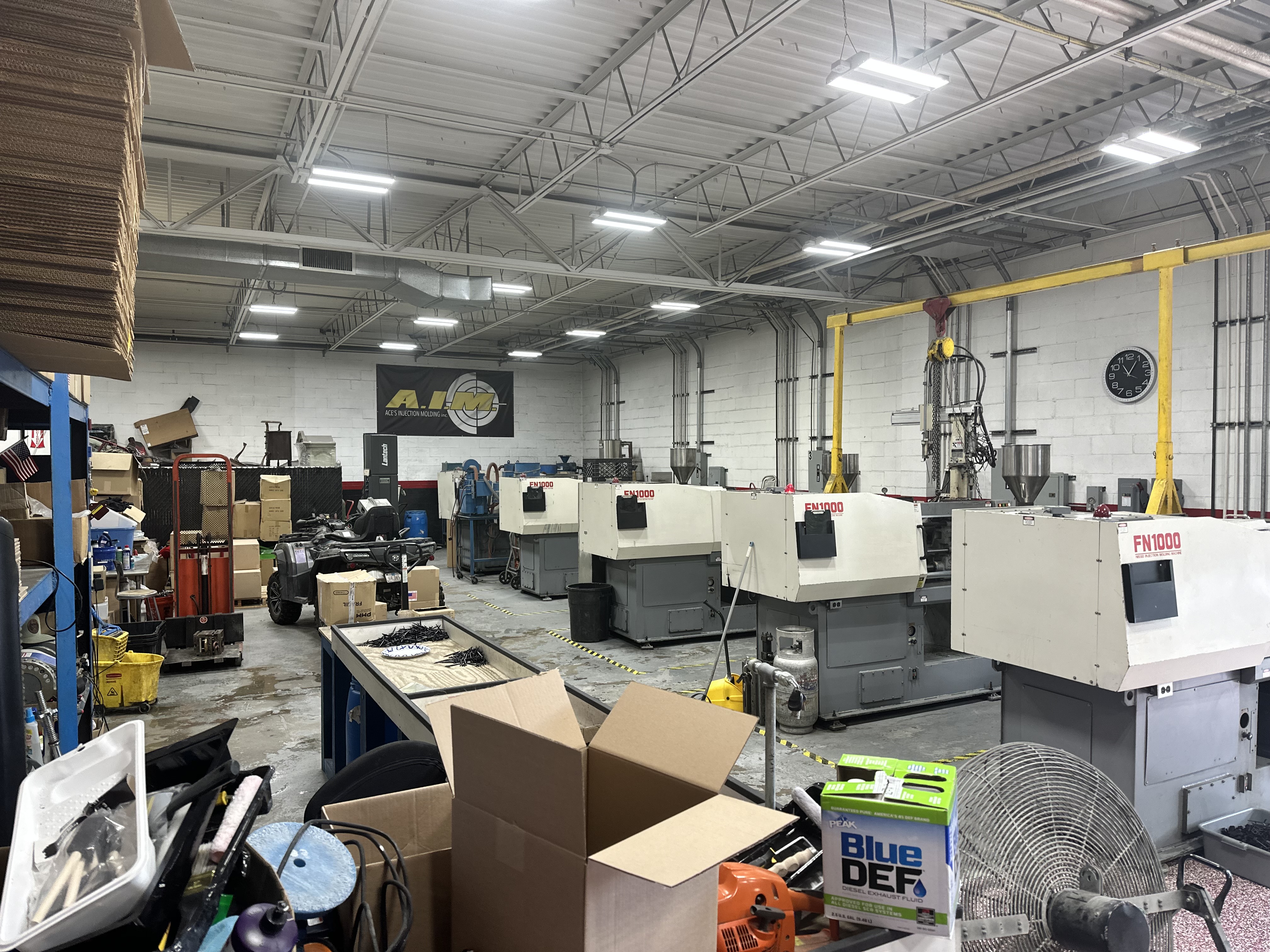 Ace's Injection Molding shop floor — rows of plastic injection molding machines in Bohemia Long Island NY